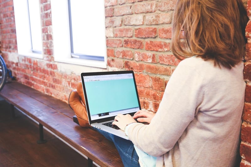 Business Woman Working on Laptop